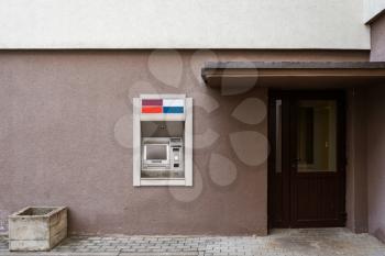 ATM built into a wall in a shopping area