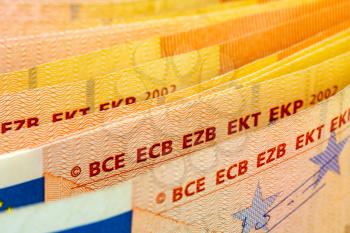 Close-up of fifty euro banknotes in a row. Selective focus, shallow DOF.