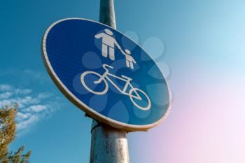 Cyclist & pedestrian road sign. Low angle view.