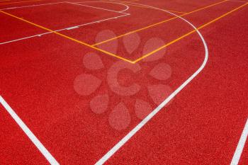 Colorful basketball lines on an outdoor court