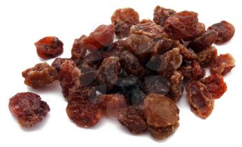 Black dried raisins isolated on the white