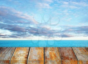 Wooden pieron sunny day with blue sky