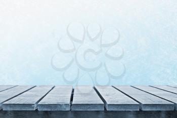 Frozen table and snowy background