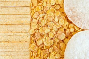 The texture of corn flakes, round and rectangular dry breads