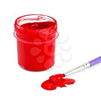 Jar of red gouache, brush and blot stained isolated on a white background