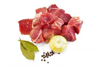 Chunks of pork, two laurel leaf, black pepper, peas, onion, isolated on a white background