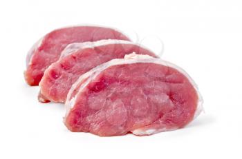 Three slices of pork meat isolated on white background