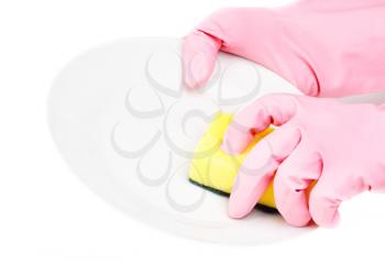 Royalty Free Photo of Hands in Pink Plastic Gloves Doing a Dish