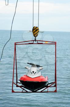 jet ski lift for dry storage   on the sea  background
