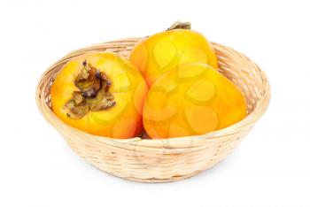 Persimmon fruit in fruit basket on white background