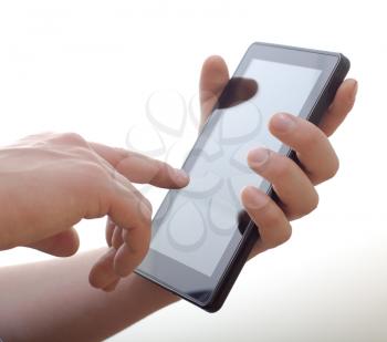 Royalty Free Photo of Hands Holding a Tablet