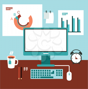 office desk with computer and graphics illustration