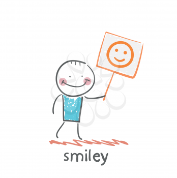 man holds a poster with a smiley