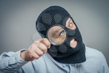 Man Wearing Mask and magnifier