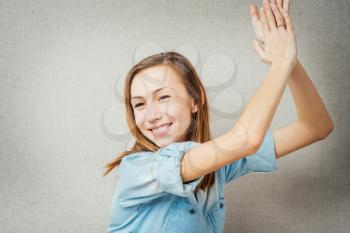 Happy business woman applauding 