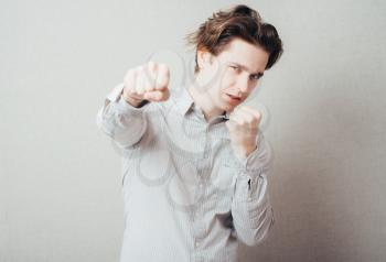 man with his fists ready to fight