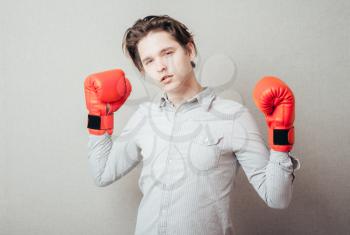 Business man ready to fight with boxing gloves 