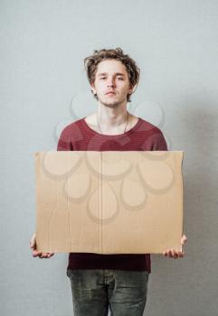 man holding cardboard