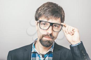 businessman corrects glasses for eyes