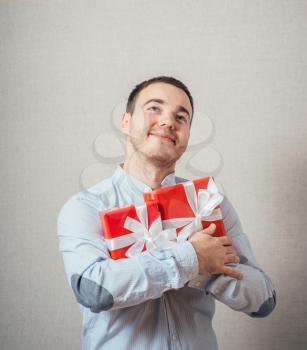 Businessman hold with gift box