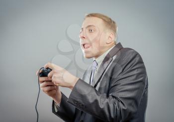 Man playing a video game using a joypad
