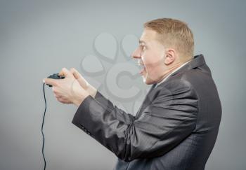 Man playing a video game using a joypad