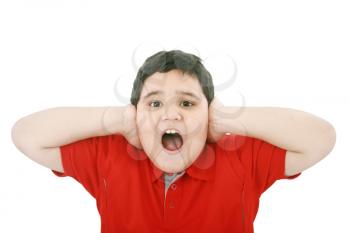 Horizontal portrait of a young boy yelling 
