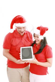 Couple enjoying their new touchpad on christmas