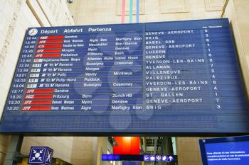 Board schedules of trains and arrives at the station