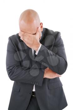 Portrait of a young business man looking depressed from work isolated over white background 