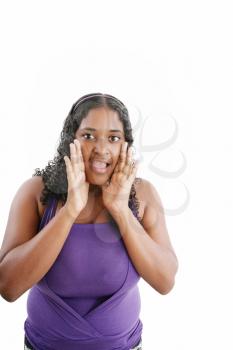 excited scared, terrified black woman, young african girl surprised, looking at camera, isolated over white background 

