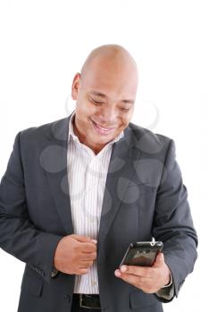 Portrait of an African American businessman text messaging 