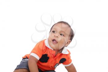Closeup of happy one year old hispanic baby boy on isolated background 