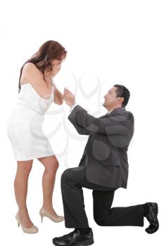 young man down on his knee proposing to girlfriend 