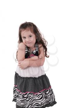 Royalty Free Photo of a Happy Child With Her Arms Crossed