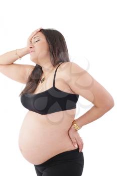 Royalty Free Photo of a Pregnant Woman in Discomfort