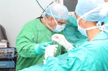 Surgeon making a suturation