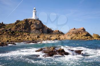 Royalty Free Photo of the Corbiere Lighthouse in Jersey, The Channel Islands