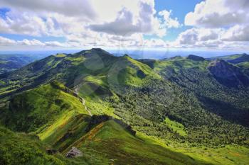 Panoramic landscape of volcanic mountains (view from Puy de Sancy, Massif Central, France)