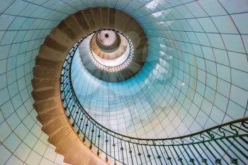 View of high lighthouse blue staircase,  vierge island, brittany,france