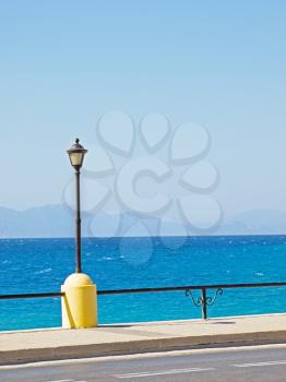 View on Aegean Sea from Rhodes embankment with turkish coast and clear sky in background