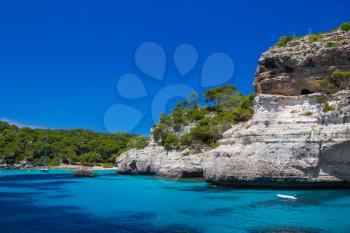 Cala Macarelleta beach cliffs at Menorca island, Spain.