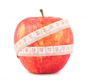 Royalty Free Photo of a Tape Measure Wrapped around an Apple