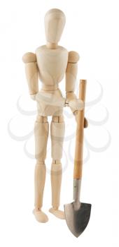 Royalty Free Photo of a Wooden Mannequin Standing with a Shovel