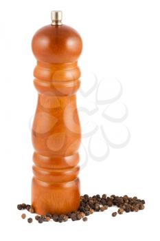 Wooden pepper mill and peppercorn isolated on white background