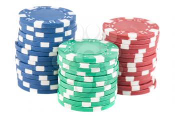 Three stacks of casino chips isolated on white background