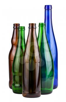 Five empty unlabeled bottles isolated on white background
