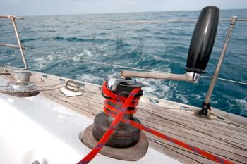 Royalty Free Photo of a Winch With Rope on a Sailing Boat in the Sea