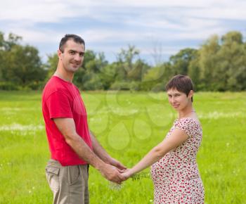 Royalty Free Photo of a Husband With His Pregnant Wife