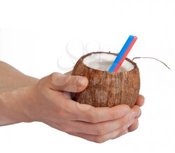 Royalty Free Photo of a Man Holding a Coconut